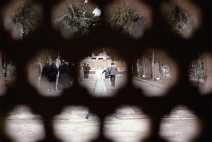 Bagh-e Fin, exterior, through screen of entrance portal, toward court. Image: 1978. Image and original data provided by Sheila S. Blair and Jonathan M. Bloom