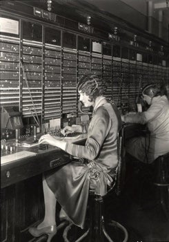Lewis W. Hine, Telephone operator at switchboard, ca. 1922. 