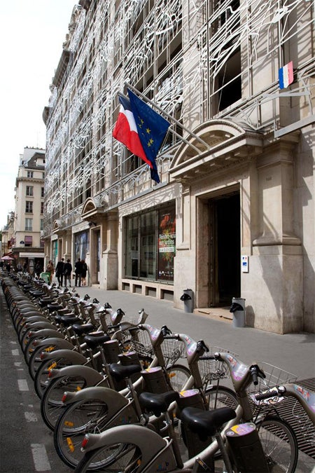 Francis Soler | Ministere de la Culture et de la Comunication; sidewalk view with rental bike rack to the left, 2005 | Paris, France | Image and original data provided by ART on FILE, artonfile.com