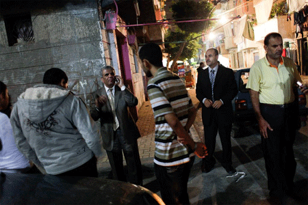 Jason Larkin | Sobhi Saleh, surrounded by Muslim Brotherhood volunteers and members, tries to organise a campaigning session in his local constituency of al-Ramal; 2010 |© Jason Larkin / Panos Pictures; www.panos.co.uk