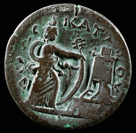 Coin from period of Antoninus Pius; verso with Isis holding sail and sistrum, lighthouse of Pharos, and inscription in Greek; 2nd cent. CE | National Maritime Museum, Haifa, Israel | Image and original data provided by Erich Lessing Culture and Fine Arts Archives/ART RESOURCE, N.Y.; artres.com