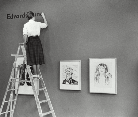 Rollie McKenna, photographer | Installing the exhibition, "The Graphic Work of Edvard Munch." | February 6, 1957 through March 3, 1957 | Photographic Archive; The Museum of Modern Art Archives, New York | © 2008 Artists Rights Society (ARS), New York / Bono, Oslo