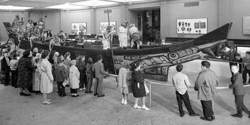 Children viewing North West Coast Canoe, 77th Street Foyer, 1962, American Museum of Natural History, Photographer: Alex J. Rota. Image and original data provided by Library, American Museum of Natural History