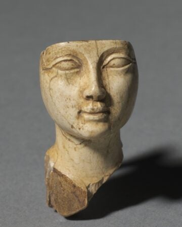 Egypt, New Kingdom, Dynasty 18, reign of Amenhotep III. Face from a Cosmetic Spoon. 1391-1353 BCE.