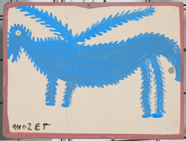 Painting of a blue, four-legged creature with outstretched wings on a cream-colored background.