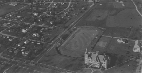 Aerial photograph looking northwest from University Avenue over Southwestern University Main Building and Athletic Field.