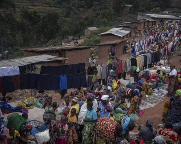 Groups of women at the Drodro village marketplace in Ituri province, Democratic Republic of Congo.
