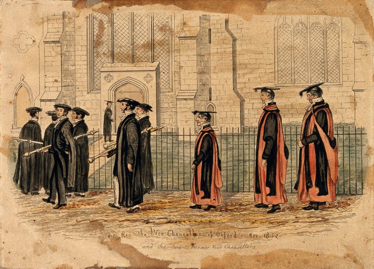 Hand-colored 19th-century illustration of an Oxford University procession: scholars in black gowns and caps, officials in red-trimmed robes, and beadles with maces walking past a Gothic chapel.