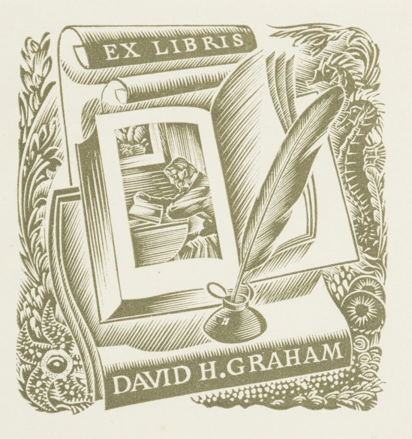 A wood engraving bookplate featuring an open book, a quill pen in an inkwell, and a scroll with the words "Ex Libris" at the top. The bookplate bears the name "David H. Graham" at the bottom, and within the open book, there is an illustration of a scholar reading at a desk. Ornamental elements, including foliage and intricate patterns, frame the composition.