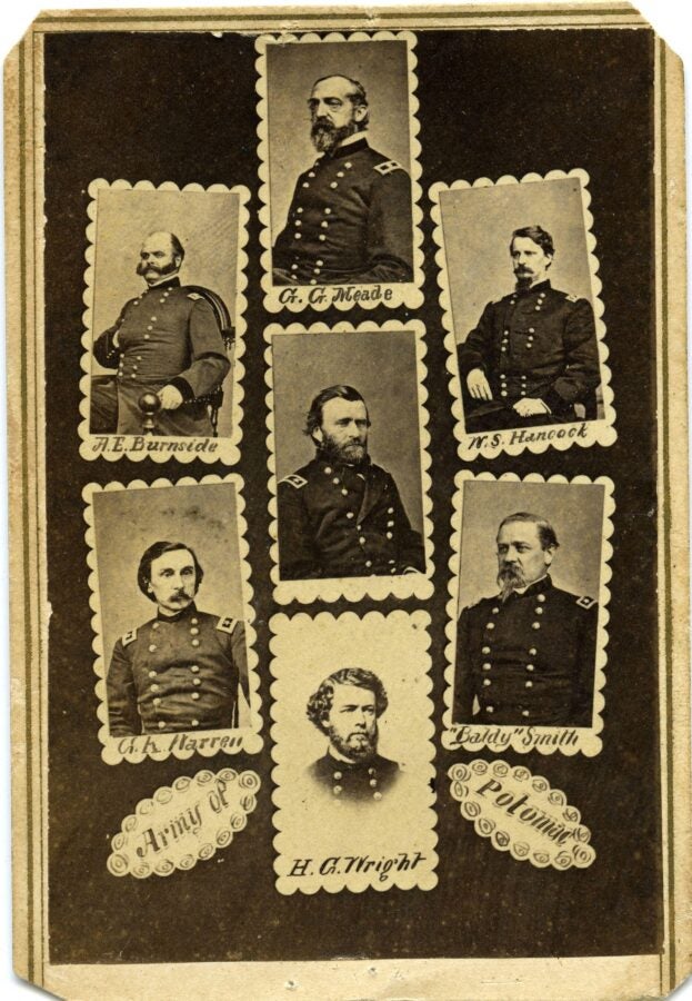 A vintage carte de visite featuring seven portraits of Union generals from the Army of the Potomac during the American Civil War. The photographs are arranged in an ornate layout with scalloped borders. The generals are identified as A.E. Burnside, G.K. Warren, G.G. Meade, H.G. Wright, W.S. Hancock, and "Baldy" Smith. The words "Army of the Potomac" are written in decorative script. The sepia-toned image is from the Norwich University Archives.