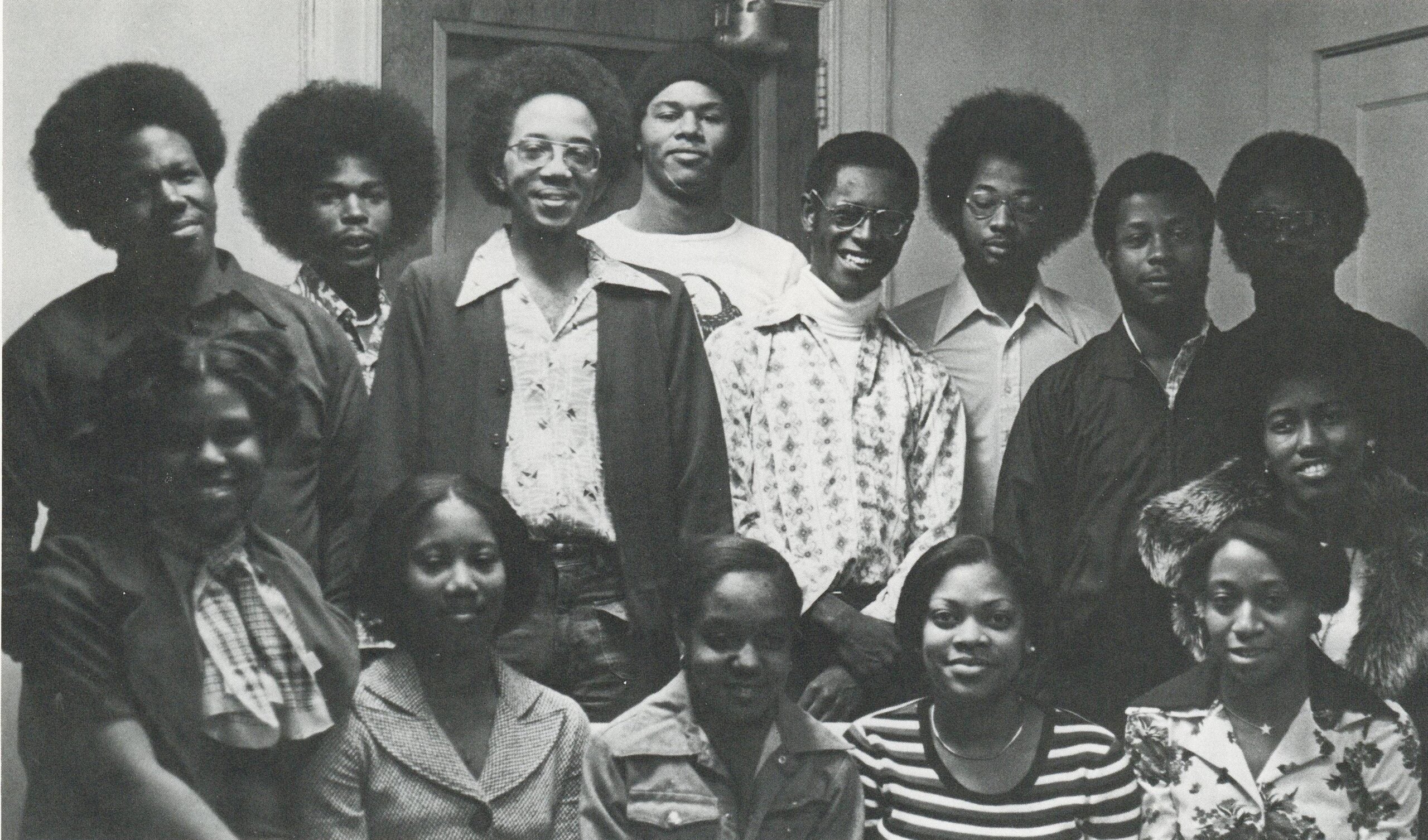 Group portrait of Black Student Union members at Rollins College, 1975–1976, posing together indoors.