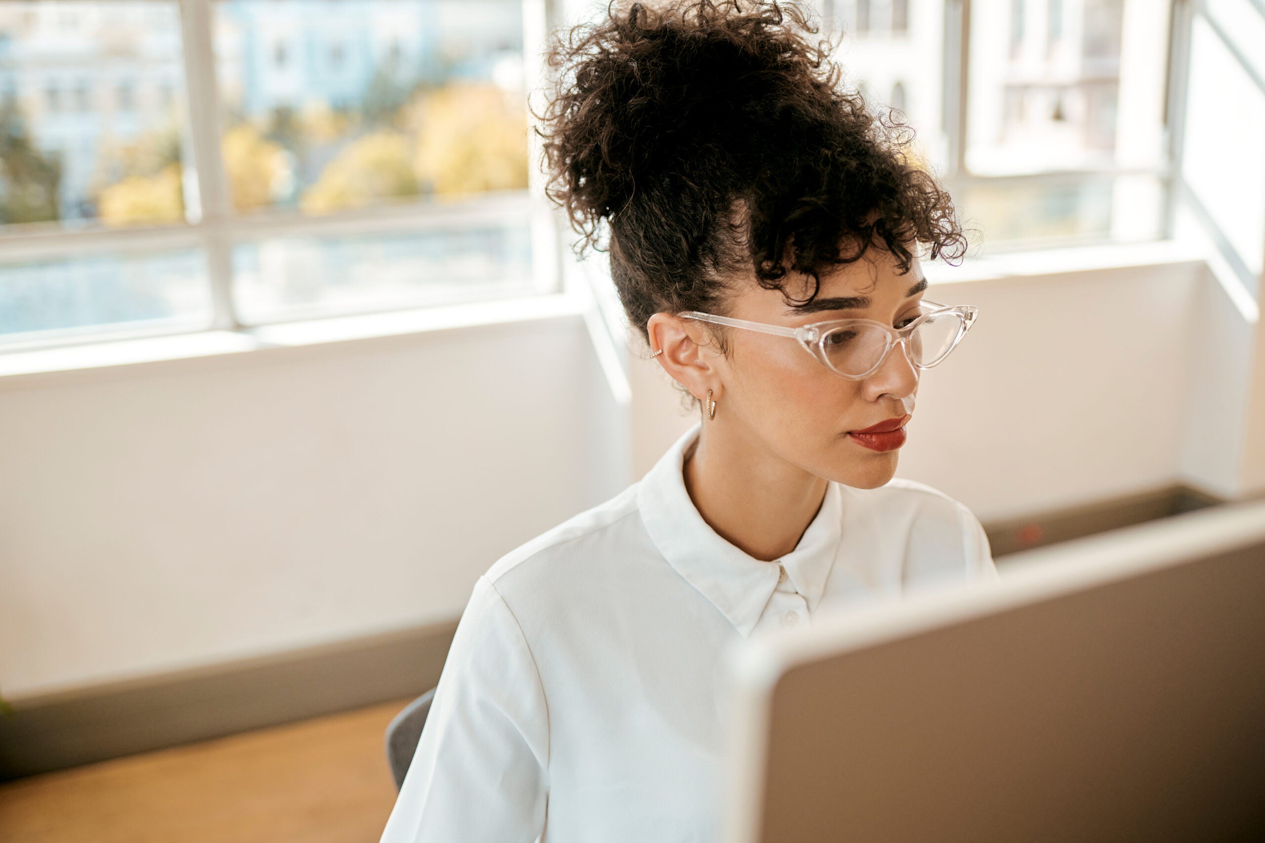businesswoman working at computer in an office