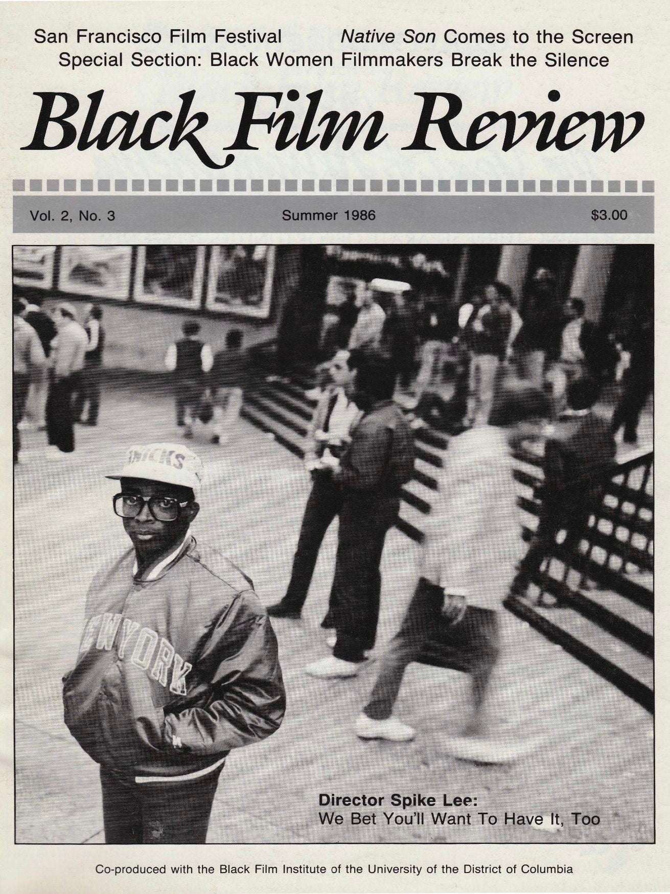 Magazine cover titled “Black Film Review,” Vol. 2, No. 3 (Summer 1986), with headlines about the San Francisco Film Festival, Native Son on screen, and a special section on Black women filmmakers; central black-and-white street photo of a person in a “New York” jacket; caption text reads “Director Spike Lee: We Bet You’ll Want To Have It, Too”; co-produced with the Black Film Institute of the University of the District of Columbia.