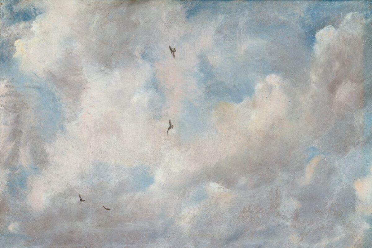 A soft, luminous painting of a sky filled with billowing white and gray clouds tinged with pink and blue. Four small birds glide through the air.