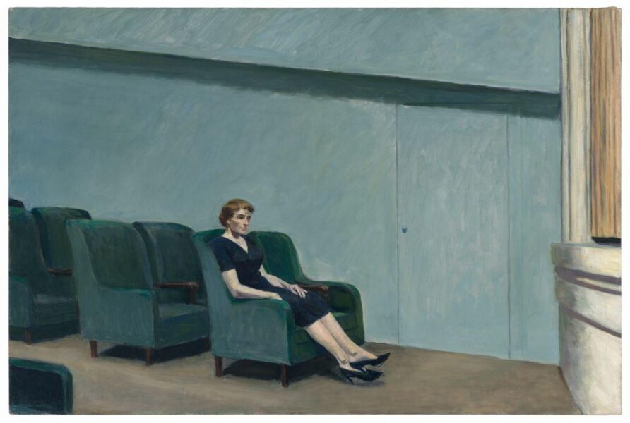 Painting of a solitary woman seated in a nearly empty theater, wearing a dark dress and looking toward the unseen stage; muted tones emphasize the quiet, contemplative atmosphere.