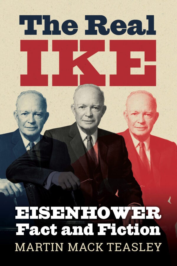 Book cover for The Real Ike: Eisenhower Fact and Fiction by Martin Mack Teasley, featuring three portraits of Dwight D. Eisenhower tinted in blue, gray, and red.