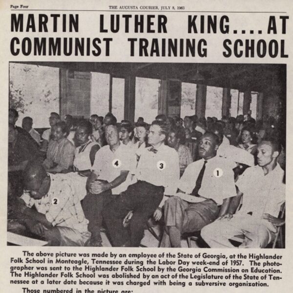 1963 newspaper clipping with photo of Martin Luther King Jr. seated among attendees at the Highlander Folk School, framed by a sensationalized headline.