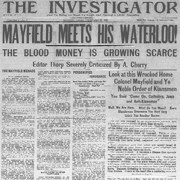 Front page of The Investigator, a 1920s anti-Klan newspaper with bold headline “Mayfield Meets His Waterloo!” and dense text columns.