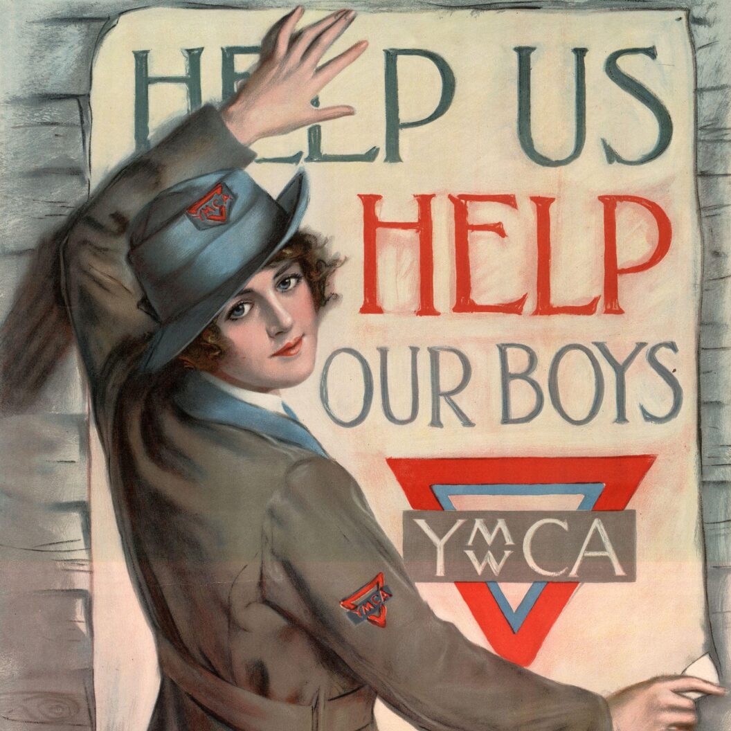 A World War I YMCA poster showing a young woman in uniform posting a sign that reads “HELP US HELP OUR BOYS” above the YMCA logo, looking back over her shoulder at the viewer.