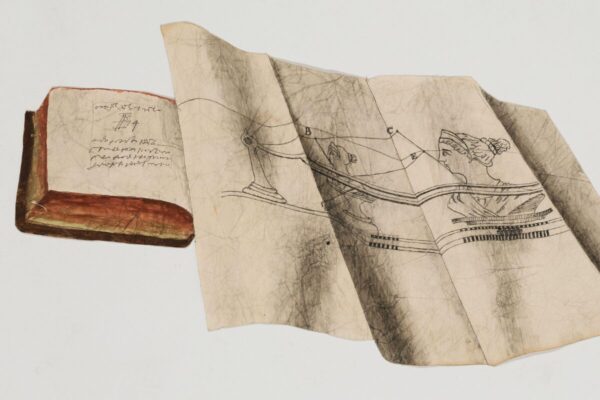 A worn open book sits beside a large, creased sheet of paper showing a detailed line drawing of a classical female figure and geometric measurements.