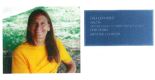  A photograph of Lisa Lesyshen, a woman with long brown hair wearing a bright yellow t-shirt, smiling warmly at the camera. She is seated in a wheelchair outdoors with green foliage visible in the background.