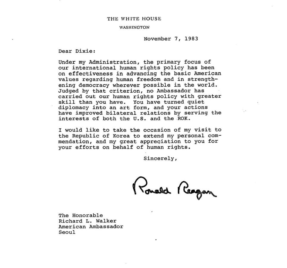 A typed letter on White House letterhead dated November 7, 1983, addressed to “Dear Dixie,” discussing U.S. human rights policy and diplomatic efforts. The letter praises the recipient’s work in advancing human rights and strengthening U.S.–Republic of Korea relations. It is signed “Ronald Reagan” and addressed at the bottom to Richard L. Walker, American Ambassador in Seoul.