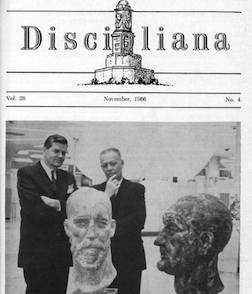 Cover of Discipliana, featuring a photograph of several men standing around a sculpted bust.
