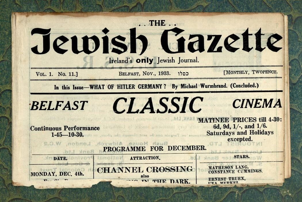 Photograph of a folded issue of The Jewish Gazette from Belfast, with the newspaper title, “Ireland’s only Jewish Journal,” and a cinema advertisement visible on the front page.