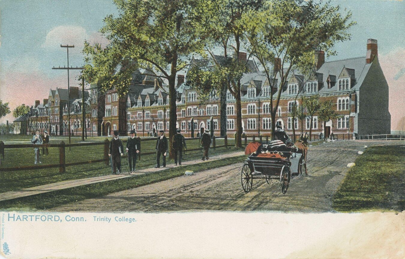 Colorized vintage postcard showing Trinity College in Hartford, Connecticut, with a long Gothic-style campus building, tree-lined grounds, pedestrians, and a horse-drawn carriage on the road.